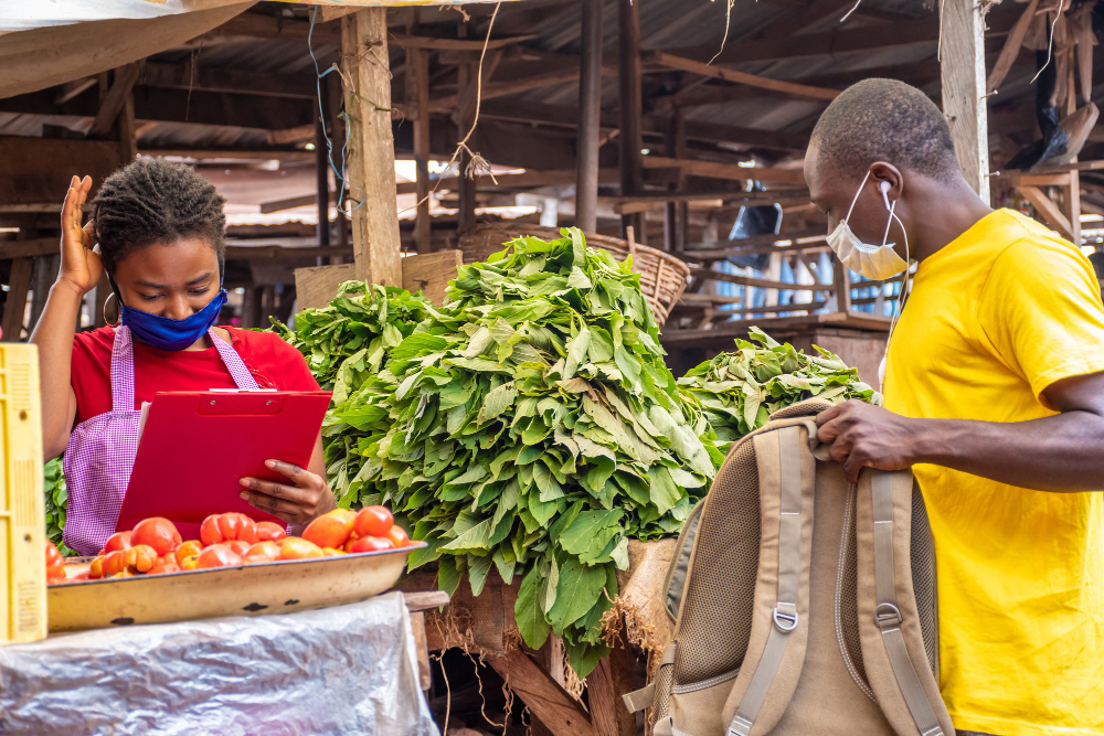 Woman entrepreneur managing stock in her retail business